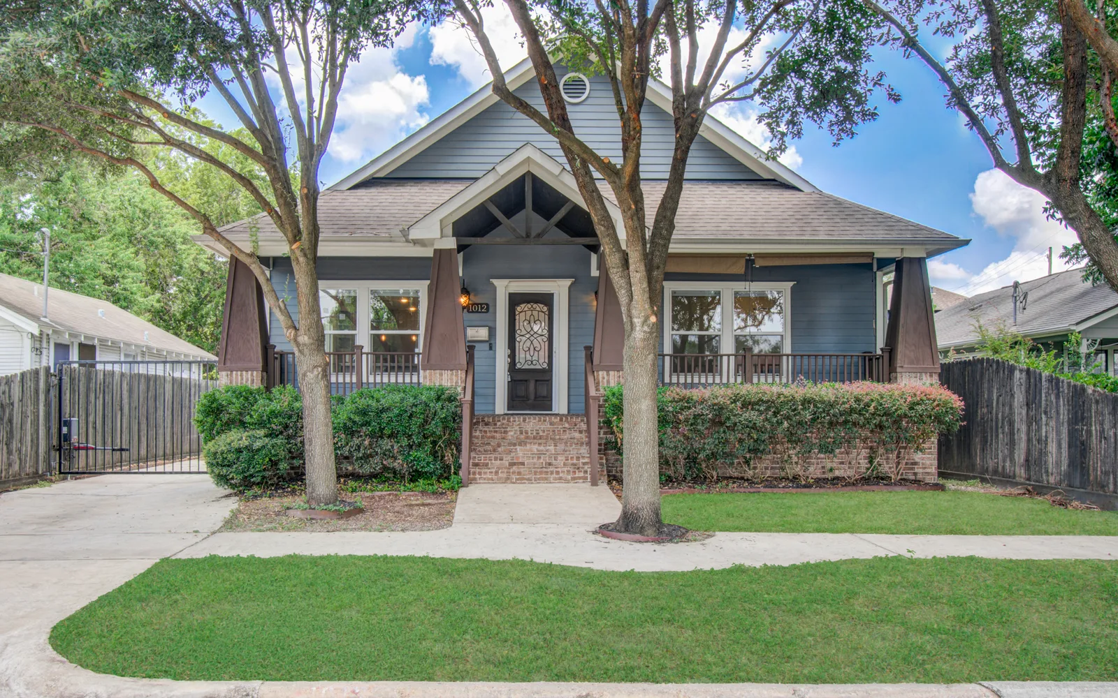 Denova Living managed rental home with a covered front porch in Houston Heights, Houston